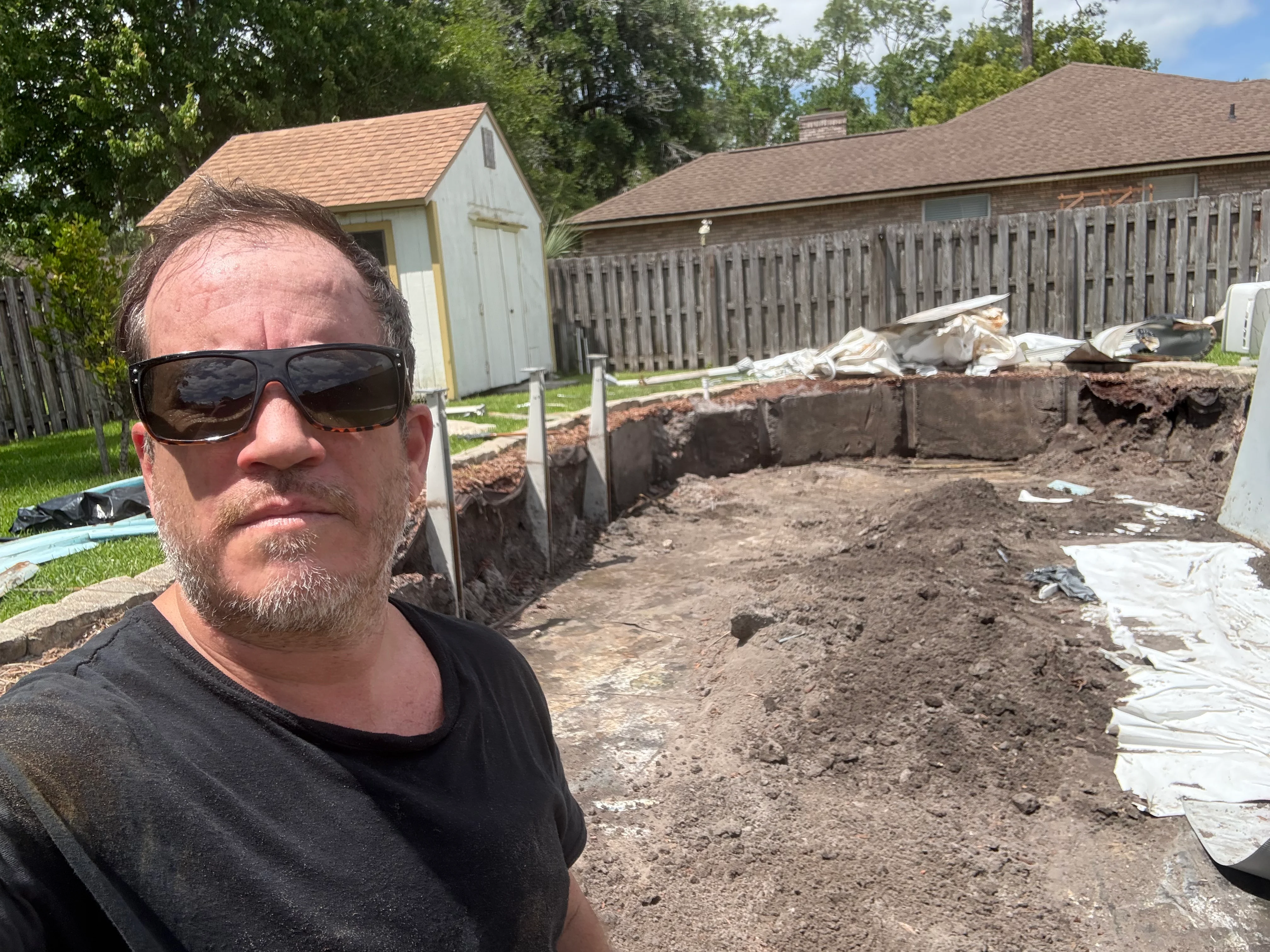 Garage with household debris and items to be removed